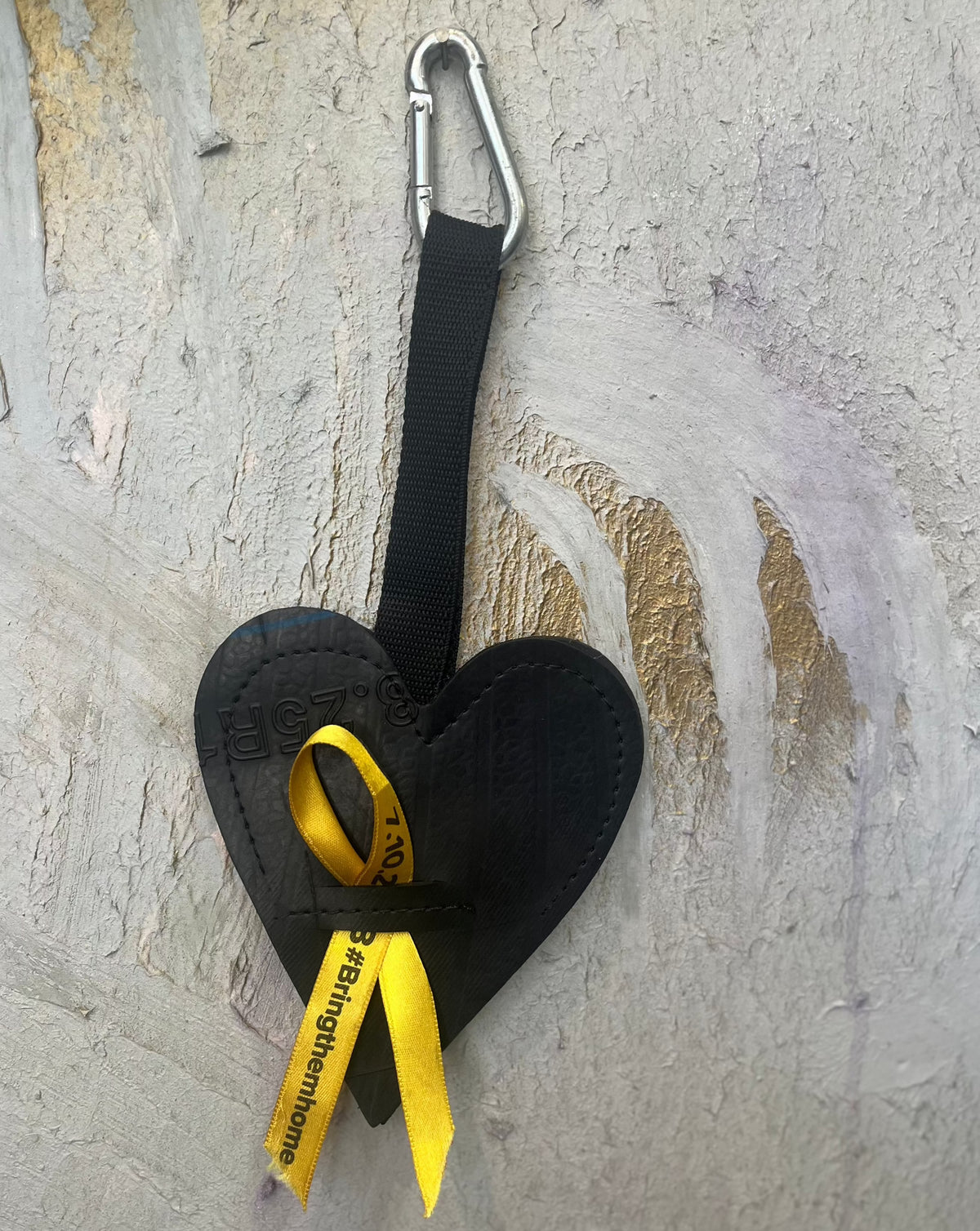 Key chain heart for BRING THEM HOME made from inner tubes .